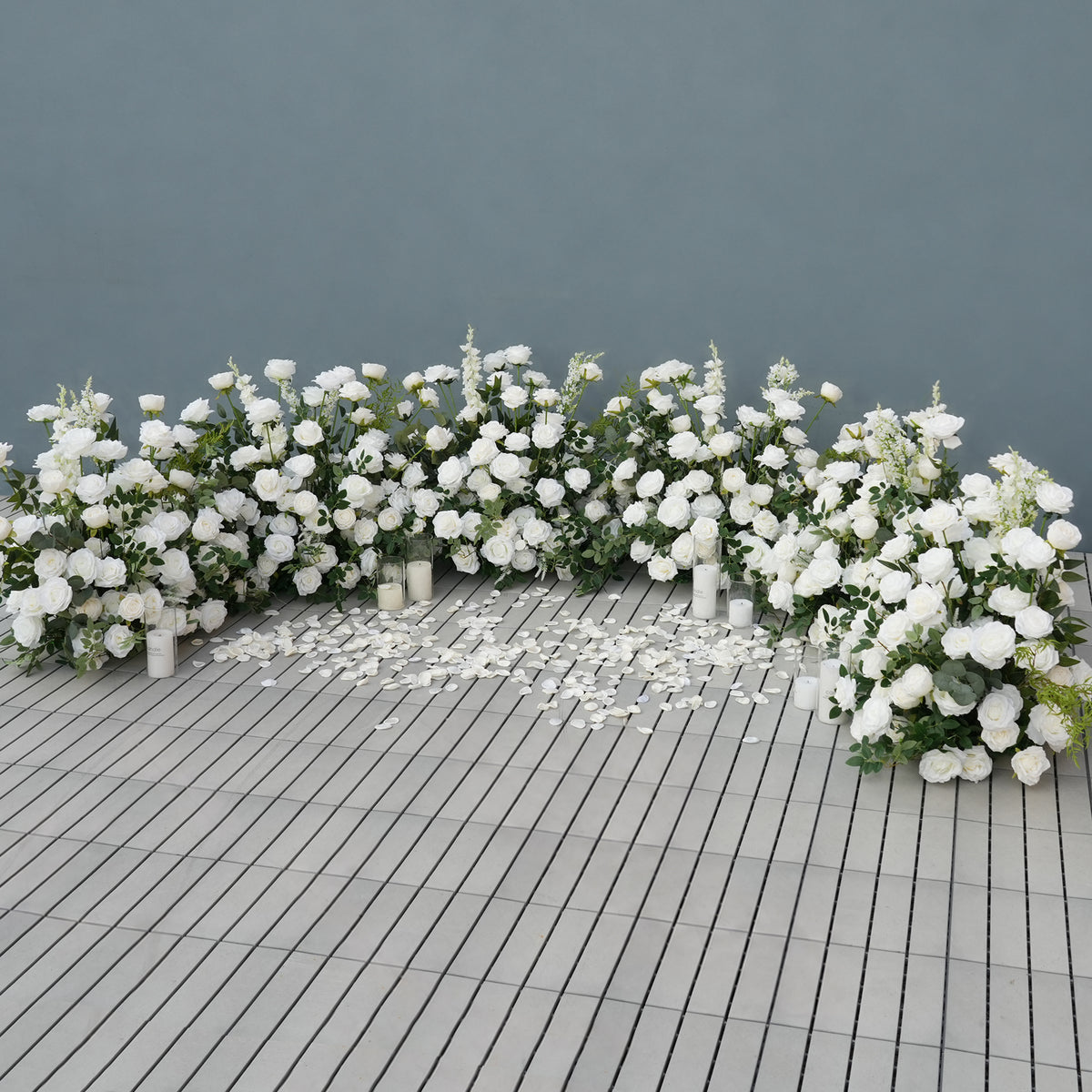 White rose ground floral arrangement for wedding aisle decor