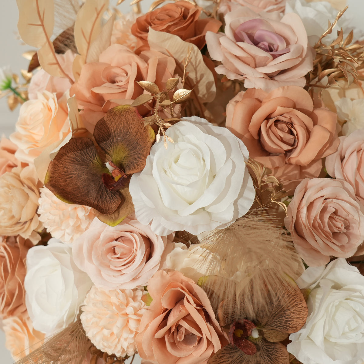 Rustic autumn wedding reception table decor with artificial pampas grass