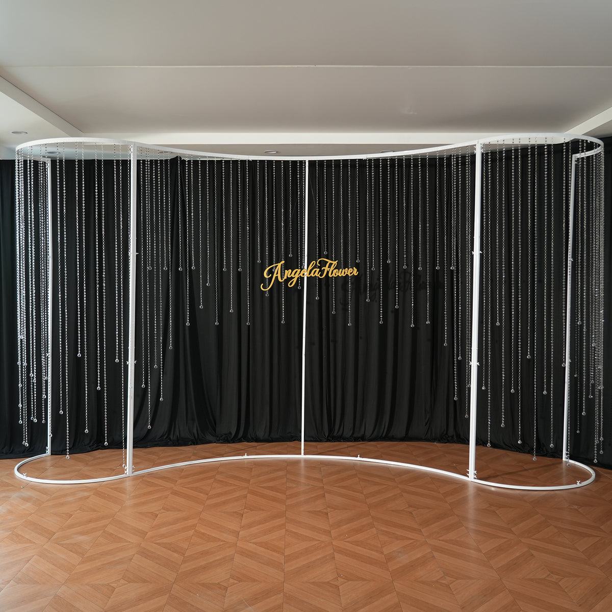 Large wavy metal frame for wedding photo booth background
