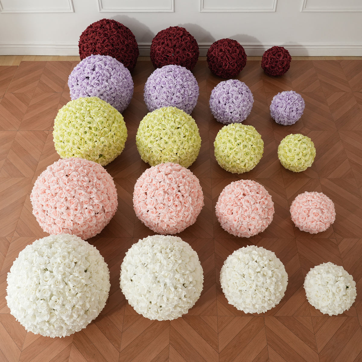 Group shot of assorted sizes artificial rose flower spheres