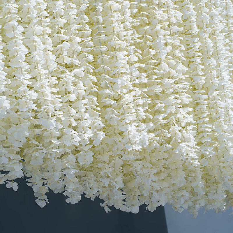 Full‑length hanging wisteria garland for wedding aisle decor