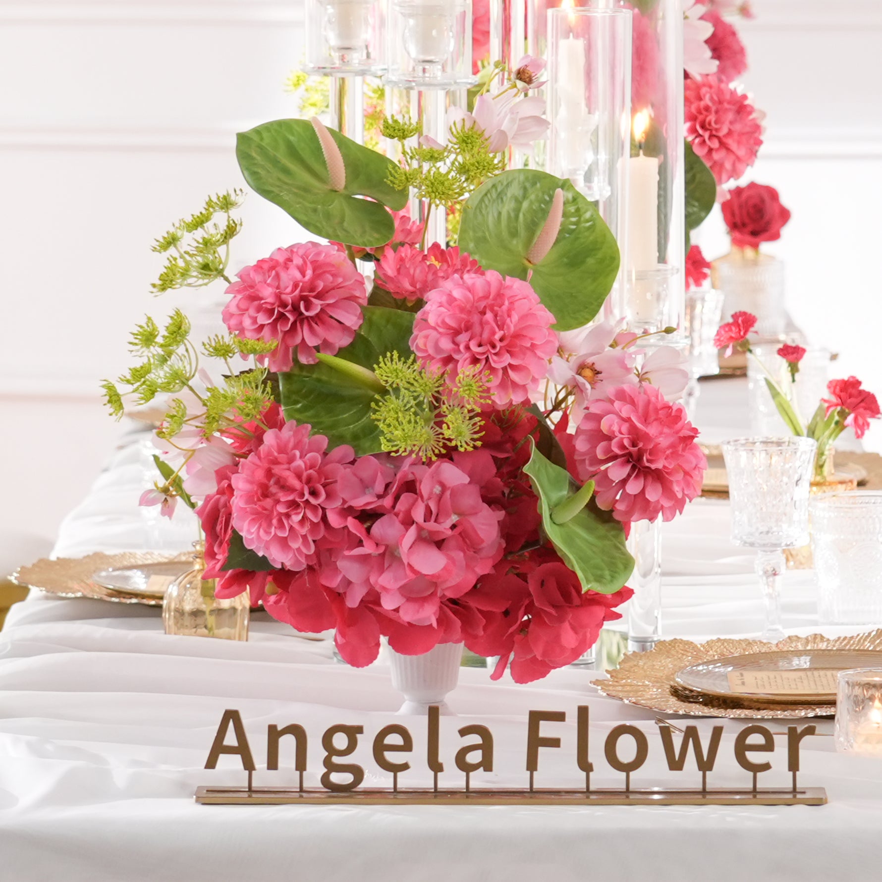 tropical‑style‑faux‑table‑center‑blooms‑pink‑dahlia‑green‑anthurium‑leaves