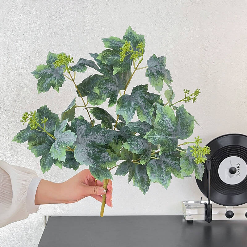 Indoor table decor fake grape foliage