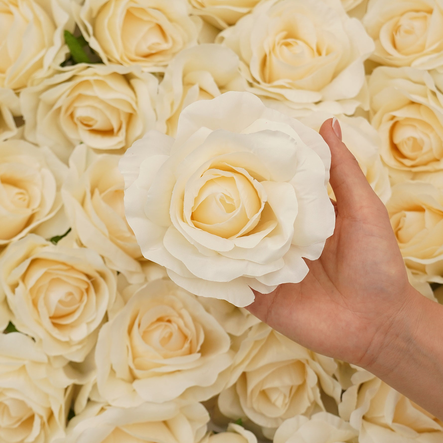 Artificial rose blossoms in assorted colors for creative styling