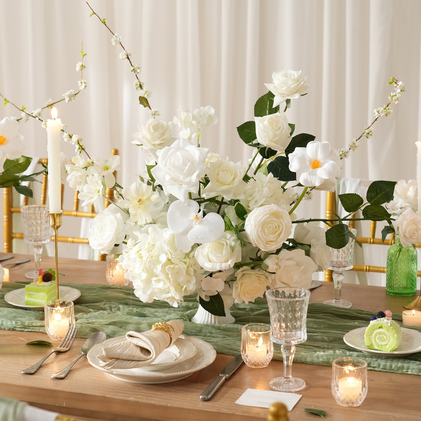 faux flower centerpiece with roses and hydrangeas
