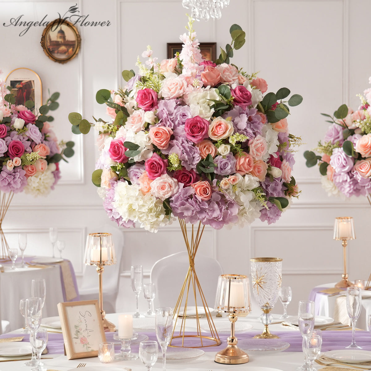 Peach and lilac artificial wedding table centerpiece for lakeside sunset wedding