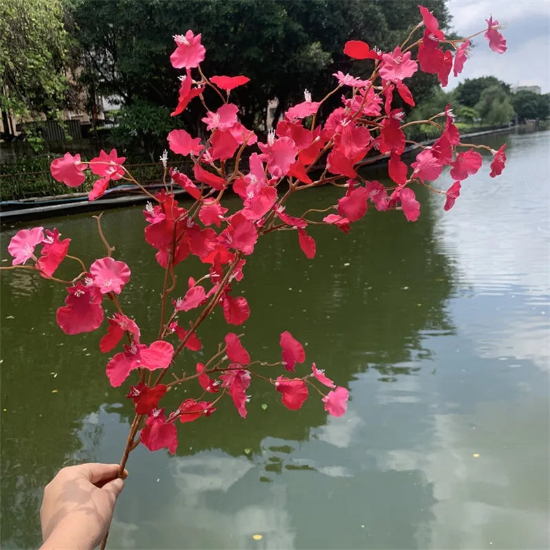 assorted‑color‑artificial‑orchid‑sprays‑event‑decor