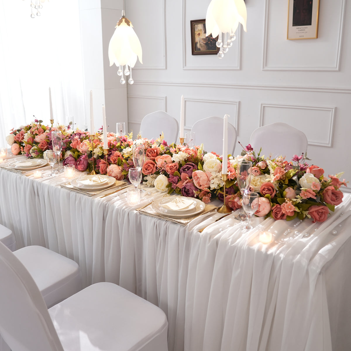 Outdoor garden wedding tablescape with mauve pink faux flower