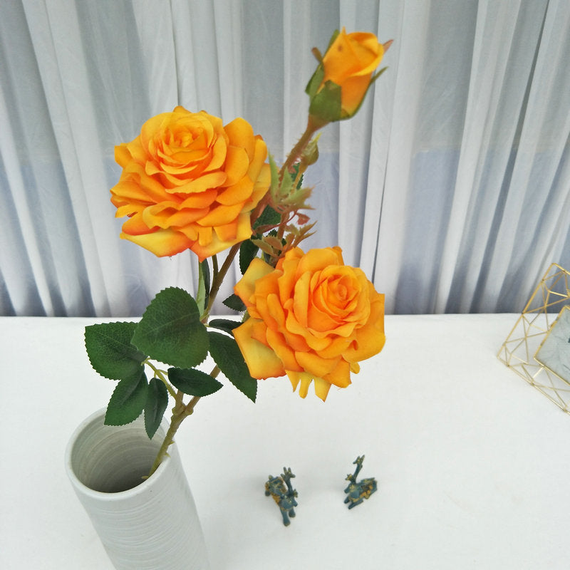 Light pink artificial rose stem blooms