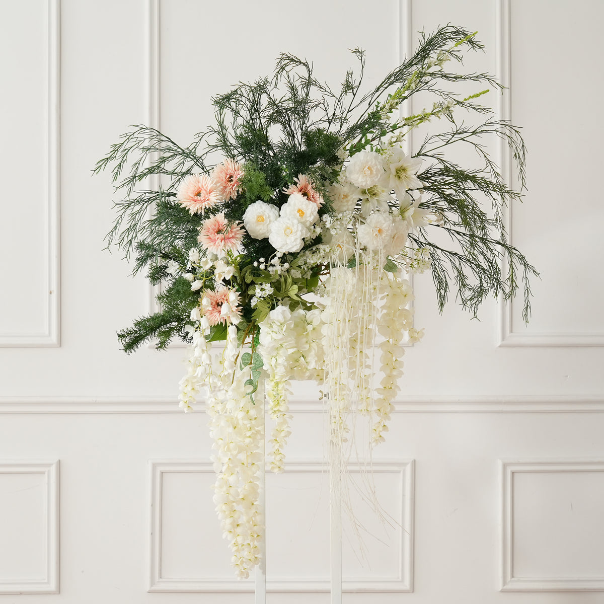 Boho artificial flower decor on irregular curved wall mirror