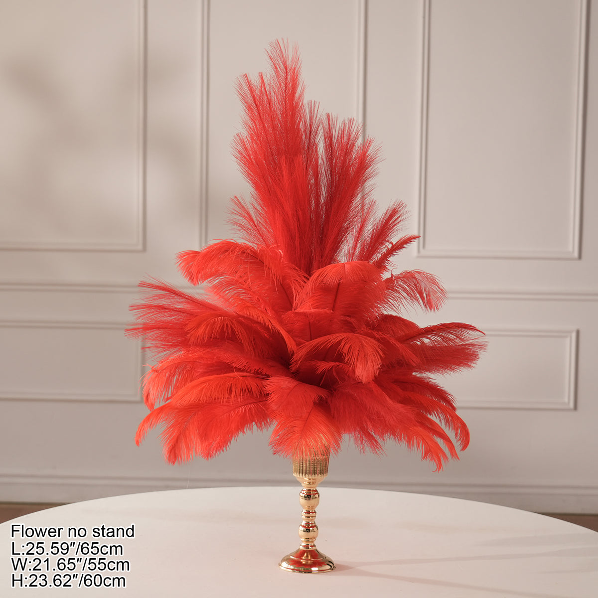 Gatsby style black ostrich feather table centerpiece with gold candle holders