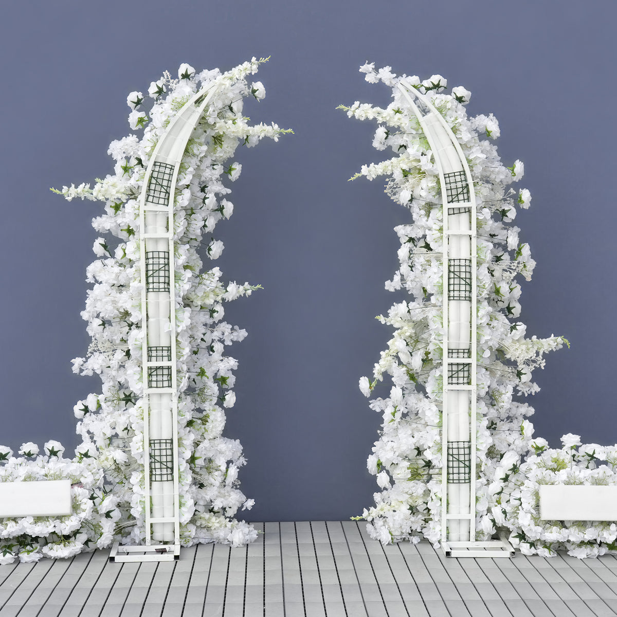 Elegant asymmetrical white flower curved arch for wedding ceremony