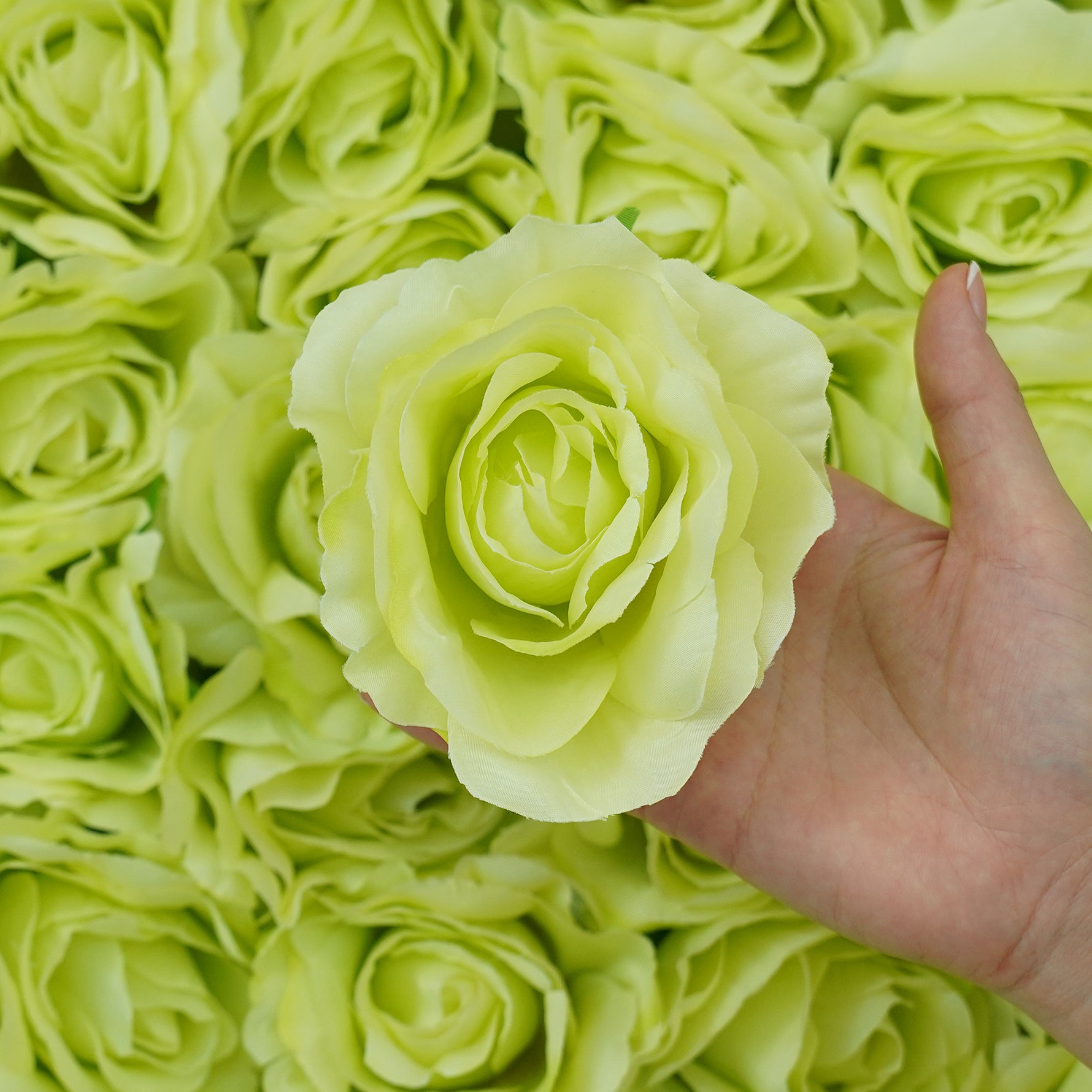 Realistic faux rose blooms for bridal decor and creative crafts