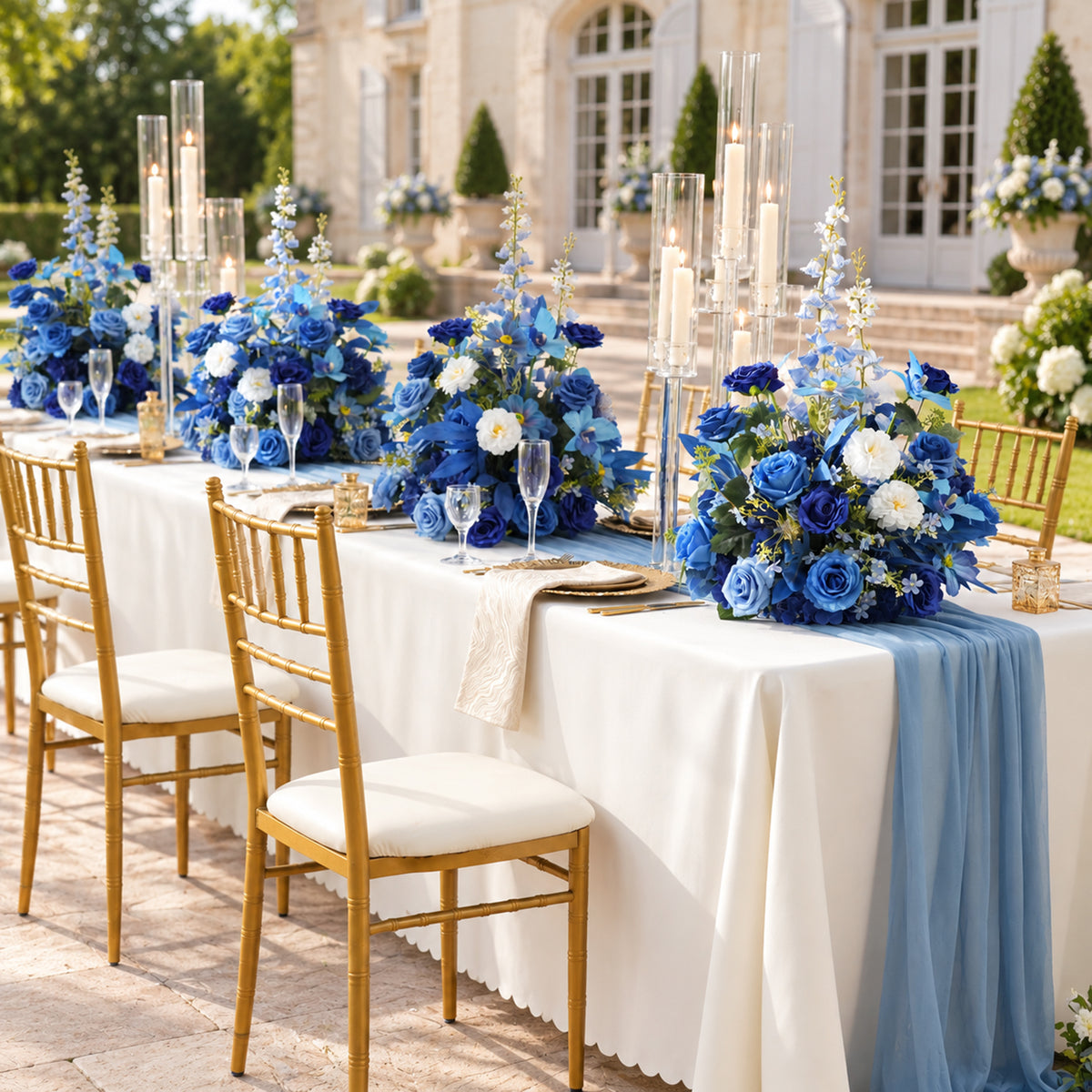 Blue artificial flower table arrangement for wedding and dinner event decor