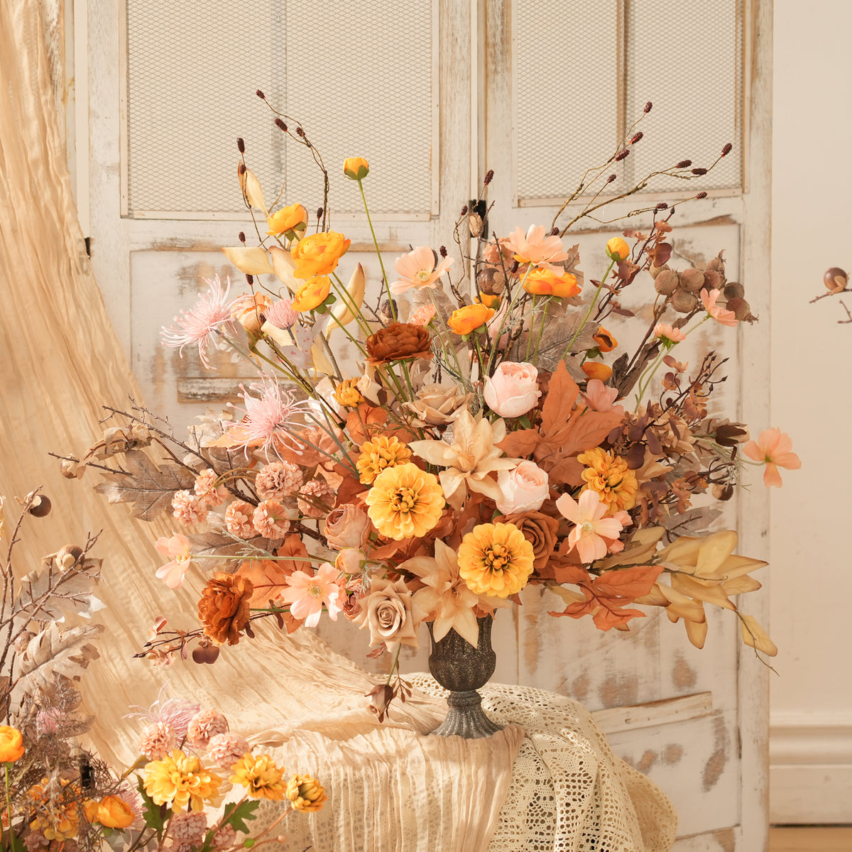 Warm fall silk flower backdrop and aisle flower decorations