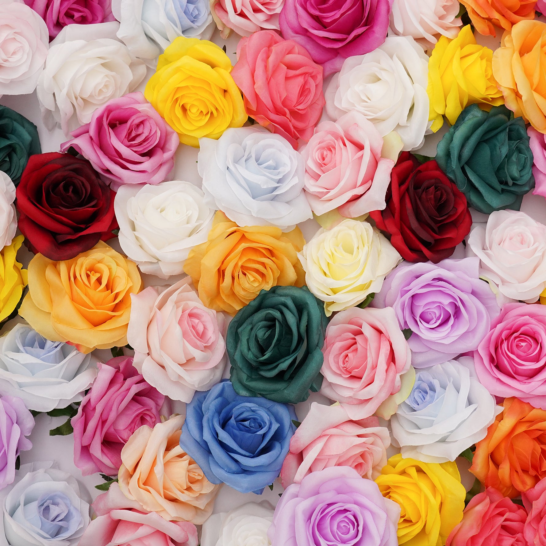 Realistic faux rose heads with soft layered petals in various colors