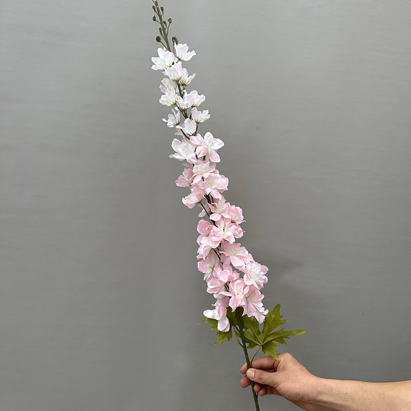 hot pink faux delphinium stem wedding backdrop