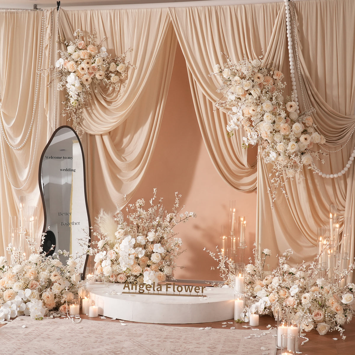wedding photo backdrop with champagne floral decor