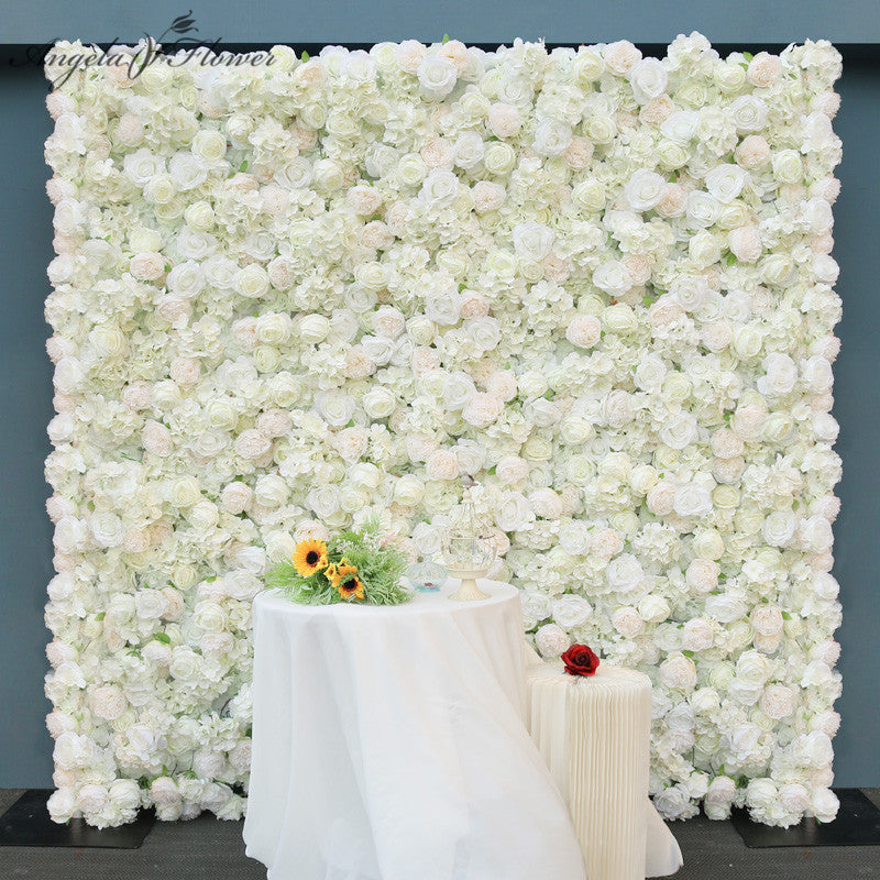 White artificial flower wall backdrop for wedding photo booth