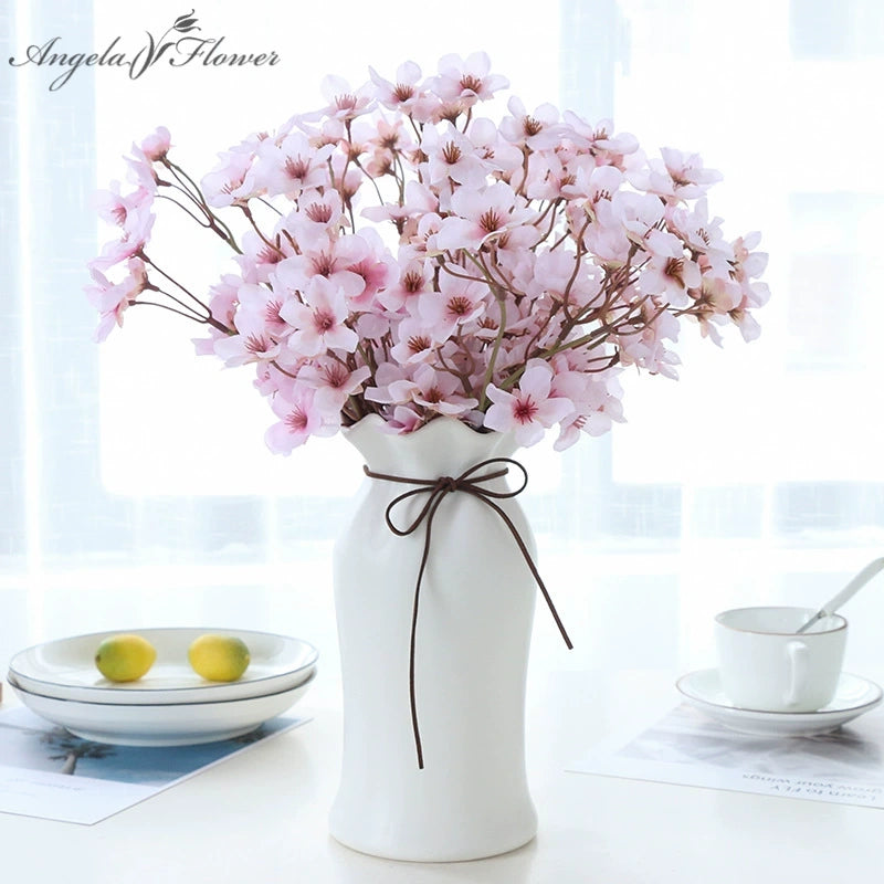 pink_faux_plum_branch_isolated