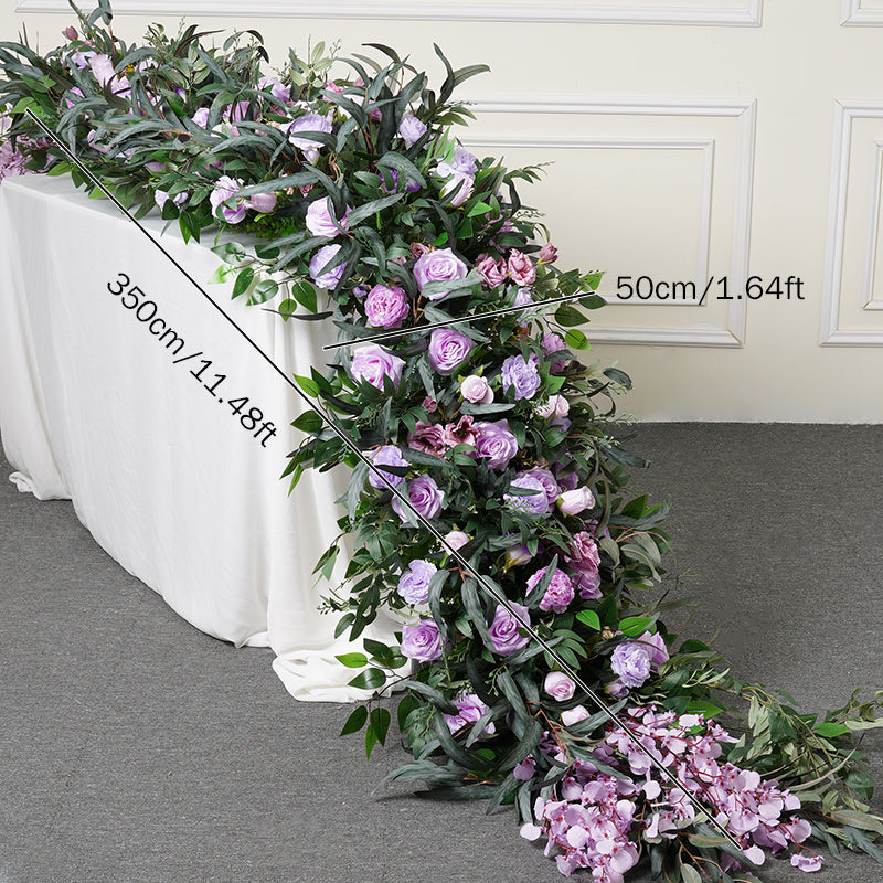 Lush full greenery swag with mixed blooms for arch decor