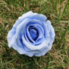 1. Orange artificial rose flower head