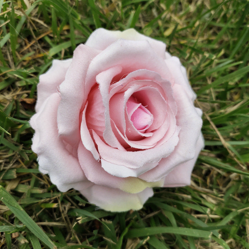 Yellow faux rose bloom