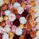 Burgundy faux rose flower head event floral design