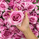 Artificial roses with natural looking petals for event decoration