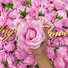 Bright artificial rose heads for custom bouquet designs