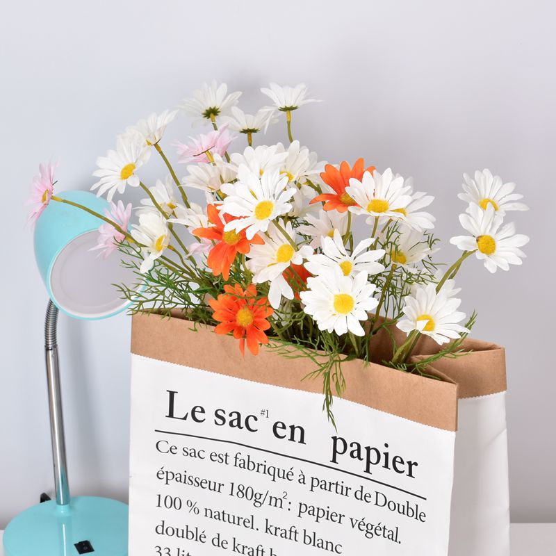 Pastel pink artificial daisy sprig
