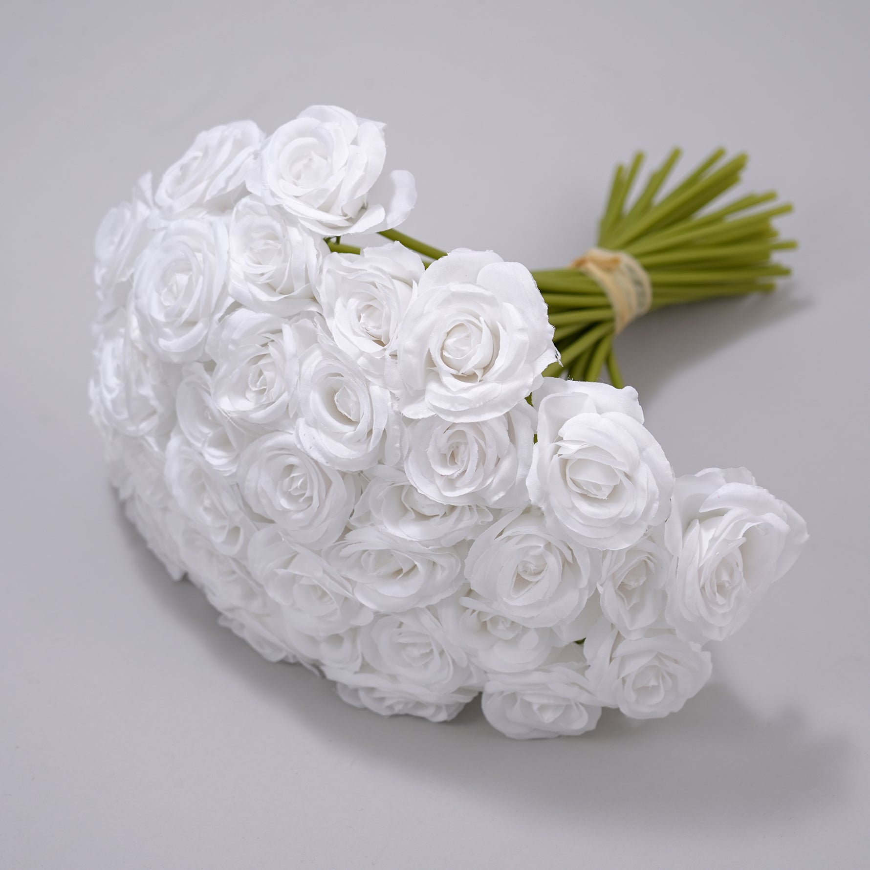 faux-silk-rose-stem-vase-decoration-closeup