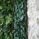 hand‑held‑faux‑jujube‑leaf‑bouquet‑white‑flower‑accents
