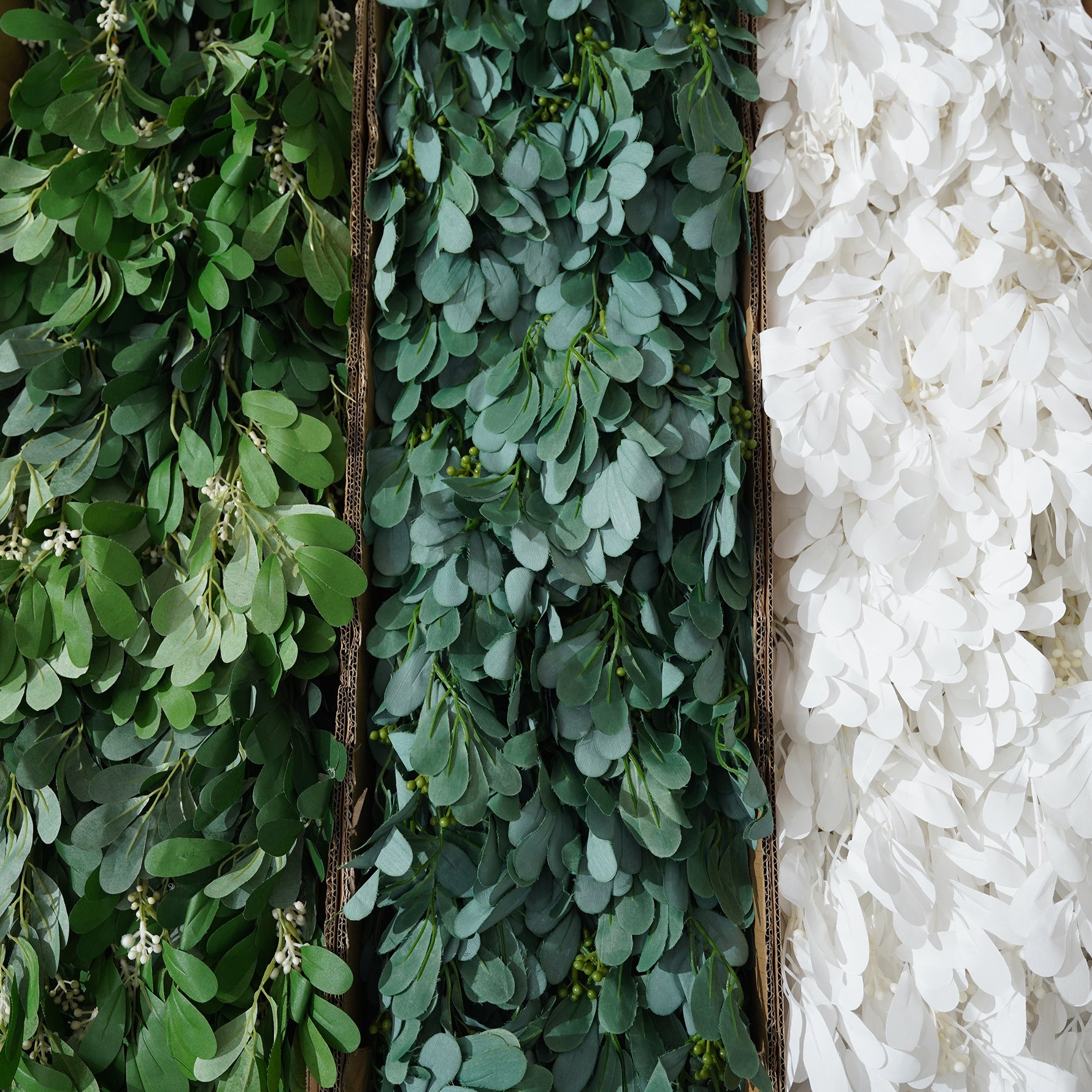 hand‑held‑faux‑jujube‑leaf‑bouquet‑white‑flower‑accents