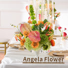 coral‑orange‑green‑artificial‑floral‑centerpiece‑candle‑holder‑background