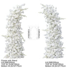 Wedding photo booth backdrop with full white curved flower arch