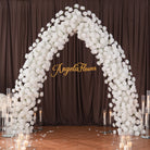 wedding_arch_with_white_floral_arrangement