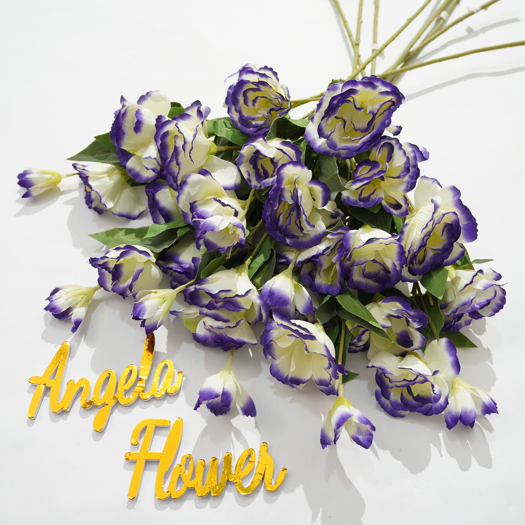 Faux lisianthus wedding reception decor
