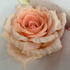 bright‑orange‑fake‑rose‑flower‑head‑detail
