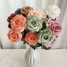 dusty-faux-rose-stem-wedding-floral-arrangement
