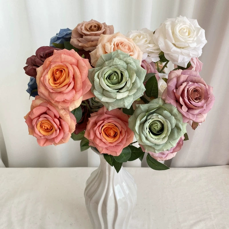 dusty-faux-rose-stem-wedding-floral-arrangement
