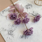 purple-fake-rose-stem-event-decor
