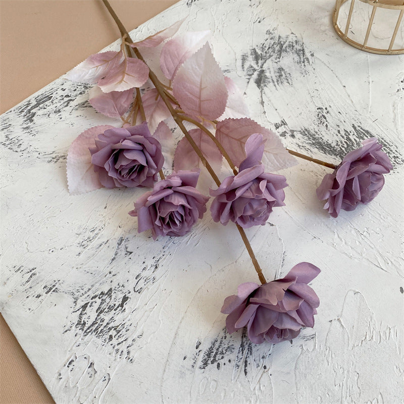 purple-fake-rose-stem-event-decor

