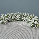 White rose ground floral arrangement for wedding aisle decor