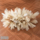 cream rose pampas grass sphere table arrangement