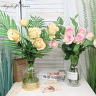 Faux rose branch wedding decor
