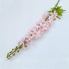 soft‑blush‑pink‑fake‑delphinium‑stems‑spiked‑bloom‑close‑up