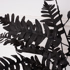 Moody table styling with mixed black artificial flowers