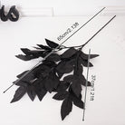 Black faux greenery branches styled in vase for home decor