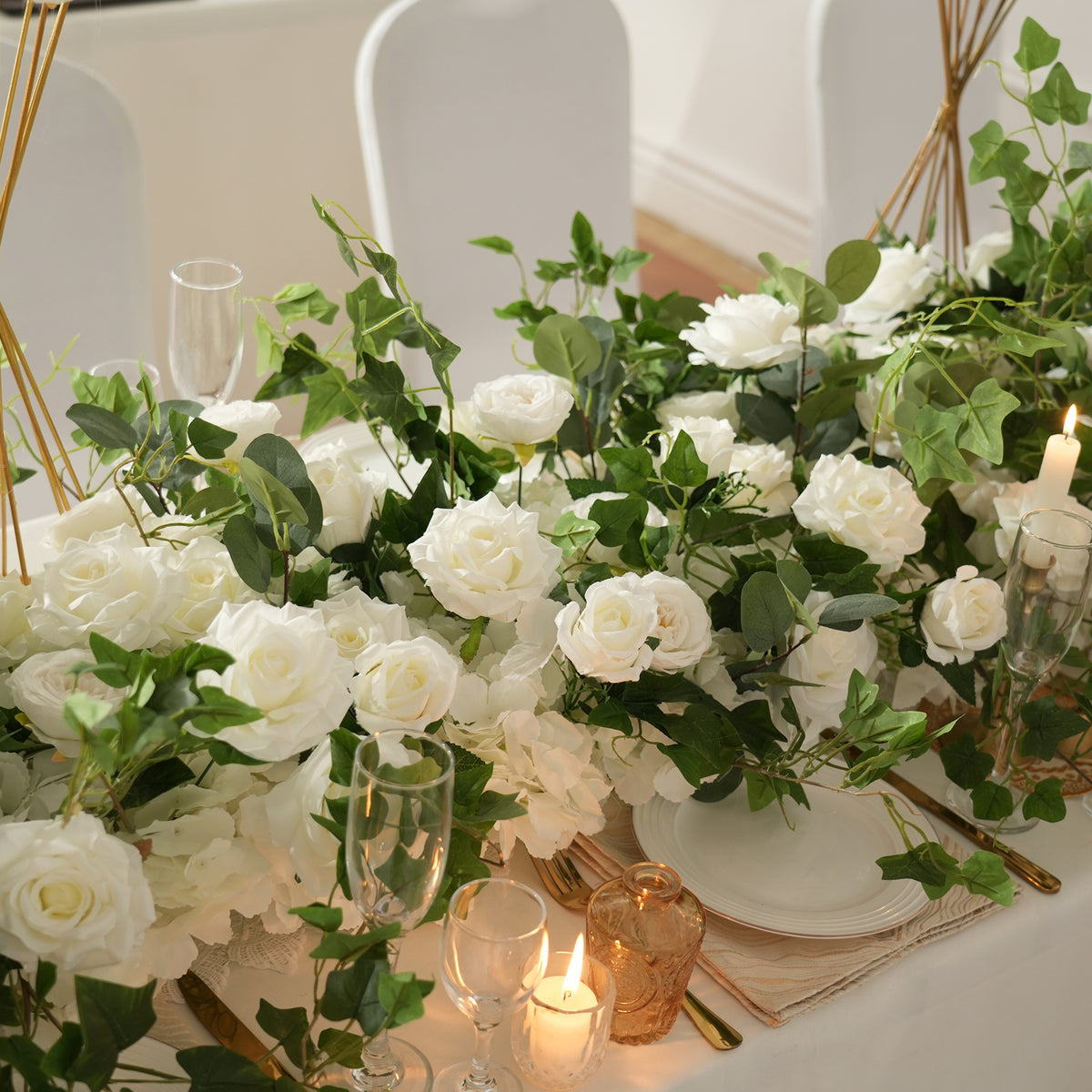 Matching flower row and tall flower ball centerpiece for wedding reception